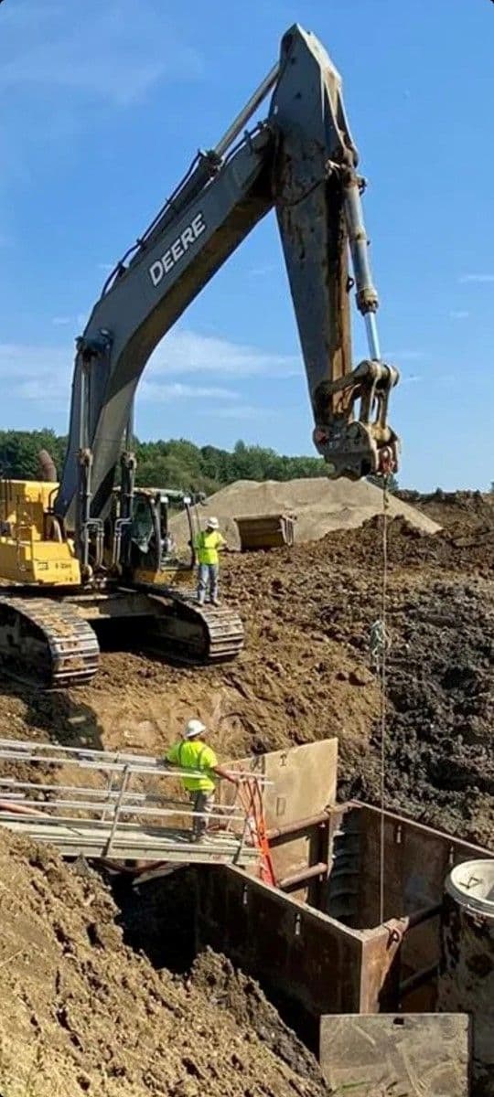 Large excavator digging at a construction site